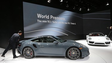 The Models of the Porsche 911 are shown on Monday, Jan. 11, 2016, at the North American International Auto Show in Detroit, Mich.