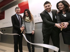 A ribbon cutting ceremony was held at the University of Windsor's new Centre for English Language Development facility on Thursday, Jan. 21, 2016. University president Alan Wildeman (L), students Xhulia Popaj, Ibrahim El-Hajj and centre director Jennie Atkins are shown during the ceremony.