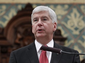 Michigan Gov. Rick Snyder delivers his State of the State address to a joint session of the House and Senate, at the state Capitol in Lansing, Mich. on Jan. 19, 2016.