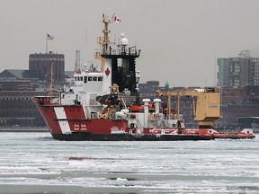 The Canadian Coast Guard icebreaker Samuel Risley cruises up the Detroit river on Thursday, Jan. 21, 2016, in Windsor, Ont. Compared to last winter, one of the toughest ice breaking seasons in decades, 2016 has been far less challenging.