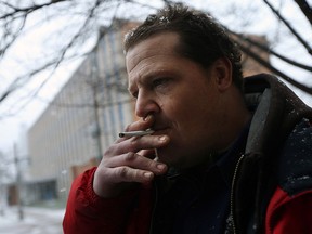 Brad Horoky smokes near city hall in Windsor on Wednesday, Jan. 20, 2016.