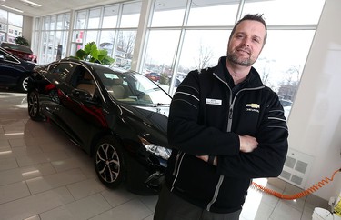 Jeff Reaume is photographed in the 2016 Chevrolet Volt at Reaume Chevrolet Buick GMC in LaSalle on Wednesday, Jan. 13, 2016.