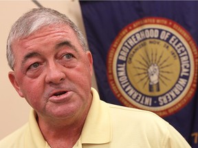 Brian Manninger, business representative for IBEW local 636, talks to the media about the Enwin employees contract at the local union hall in Windsor on Wednesday, August 2, 2012.