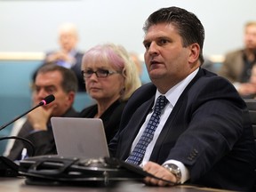 David Cooke, co-chair planning and services steering committee, Janice Kaffer, president and CEO Hotel Dieu Grace Healthcare and David Musyj, president and CEO Windsor Regional Hospital, (left to right) go before Essex County Council to ask for a levy in Essex on Wednesday, Dec. 16, 2015. The levy would go to fund the local required payment of $200 million for the new single site hospital.