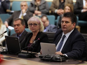 David Cooke, co-chair planning and services steering committee, Janice Kaffer, president and CEO Hotel Dieu Grace Healthcare and David Musyj, president and CEO Windsor Regional Hospital, (left to right) go before Essex County Council to ask for a levy in Essex on Wednesday, December 16, 2015.