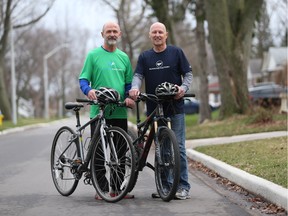 Jim Stewart, left, and Marty Denonville are progressing on a cycling trip across Canada as a fundraiser against Huntington's disease.