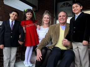 Sally Bennett Olczak and her husband Thomas Olczak adopted biological siblings Charles, 10, left, Elizabeth, 7, and Winston, 8, from Bulgaria. While the end result has been pure joy, the process was expensive, intrusive and far from easy.
