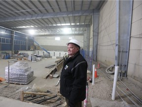 Aquatic Complex project manager Don Sadler surveys construction work at the new community pool at the WFCU Centre in Windsor, Ont.