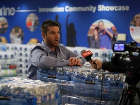 Nathon Sellon of the Windsor Spitfires talks about the generous donations of water before the OHL game at WFCU Centre on Thursday, Jan. 21, 2016. More than 40,000 bottles were collected for the residents of Flint, Mich. "It's a crisis. The people there need our help," Tamara Dudal said.