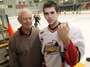 Former NHL player Marc Reaume poses with his grandson Danny Reaume at Tecumseh Arena in this 2007 file photo.