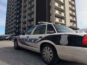 Windsor police investigate at 920 Ouellette Ave. after a man died in hospital following an incident at the downtown public housing apartment complex.