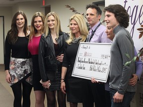 The Hotel-Dieu Grace Heathcare unveiled the newly renovated, start-of-the-art Wellness and Rehabilitation Centre on Wednesday, February 24, 2016, in Windsor, ON. Jason Petro, manager of cardiac and pulmonary rehabilitation accepted a cheque from the Probert family from proceeds raised from the 2015 Bob Probert Memorial Ride in the amount of $98,928. Pictured from left, Brogan, Tierney, Declyn, Dani Porbert, Petro, Theresa Probert and Jack Probert. (DAN JANISSE/The Windsor Star)