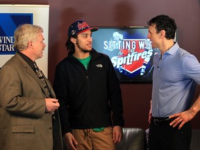 Windsor Star columnist Bob Duff, left, chats with Windsor Spitfires Jalen Chatfield and coach Rocky Thompson during taping of Sitting with Spits at News Cafe Feb. 23, 2016.