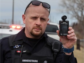 Amherstburg Sr. Const. Don Zimmerman displays his body-worn camera Tuesday which is now part the uniform.