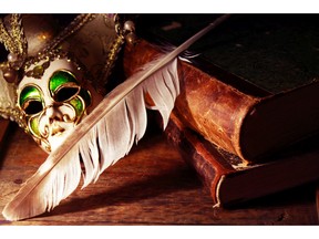 Art concept. Vintage still life with old books near Venetian mask and quill pen. Image by fotolia.com.