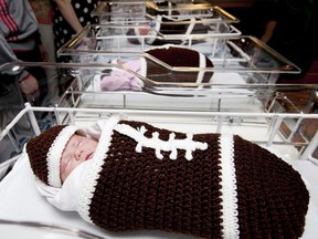 Newborn, Briar Tetreault, is pictured with other newborns at Windsor Regional Hospital Met Campus, wrapped in football cocoons for Super Bowl Sunday on Feb. 7, 2016. The cocoons were knitted by Fae Gillespie.