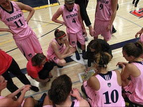 The University of Windsor's women's basketball team are pictured in pink jerseys in this 2014 file photo.