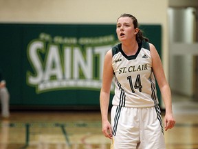 The The St. Clair Saints Shannon Kennedy watches a teammate shoot a free throw against the Lampton College Lions at the St. Clair College SportsPlex in Windsor on Friday, Feb. 5, 2016. Kennedy would go on on to break the record for most points score by a Saint.