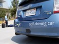 A Google self-driving car is displayed at the Google headquarters on Sept. 25, 2012 in Mountain View, Calif.