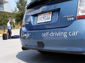 A Google self-driving car is displayed at the Google headquarters on Sept. 25, 2012 in Mountain View, Calif.