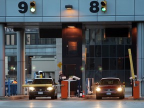 Canadian customs officers are shown on duty at  the Windsor-Detroit Tunnel in this file photo.