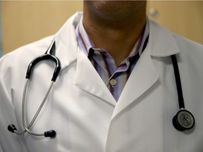 A doctor wears a stethoscope in this file photo.