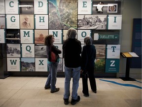 From left, Cathie Ferman, from Farmington Hills, Mich., Kirby and Nathaniel Maram, from Boon, N.C., check out the newly opened Chimczuk Museum, Saturday, February 20, 2016.