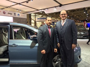 FCA Canada CEO Reid Bigland and Windsor Mayor Drew Dilkens are pictured at the Canadian International AutoShow in Toronto on Thursday, Feb. 11, 2016.