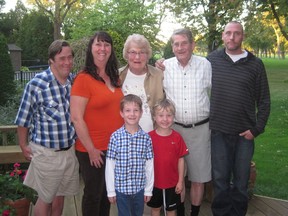 Dr. W. Sheila Cameron is shown with her family: Son Steven, standing left, daughter Janine Galloway, Cameron, husband Al and son Andrew. Grandsons Cam, left and Rowan are in the front row.