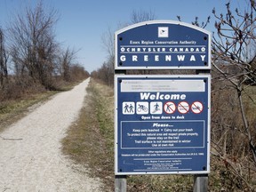 An ERCA sign is on display along the Chrysler Canada Greenway east of Walker Road in Essex, Ont., on April 11, 2009.