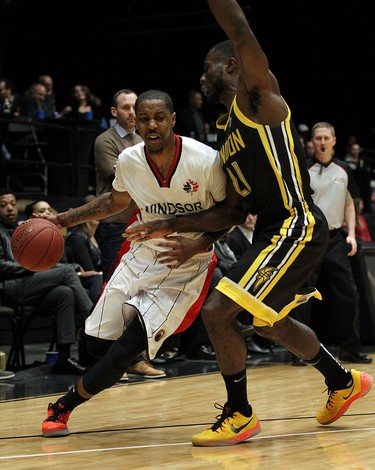 The Windsor Express' Brandon Robinson cuts around the London Lightnings Stephen Maxwill during the Clash at the Colosseum at Caesars Windsor on Wednesday, February 3, 2016.