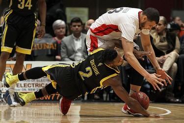 The Windsor Express' Jamal McQueen and the London Lightnings Nick Okorie collide during the Clash at the Colosseum at Caesars Windsor on Wednesday, Feb. 3, 2016.