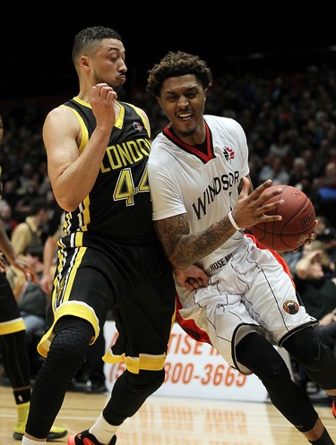 The Windsor Express' Maurice Moss drives to the net and around the London Lightnings Ryan Anderson during the Clash at the Colosseum at Caesars Windsor on Wednesday, February 3, 2016.