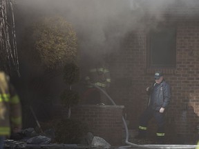LaSalle firefighters work to put out a house fire in the 2800 block of Bouffard Road in LaSalle, Saturday, Feb. 20, 2016.  There were no injuries reported.