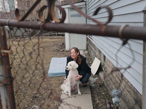 The wait list for affordable housing in Windsor is at an all-time high, with almost 3,000 people currently on the list. Shannon Thompson, who has been on the waiting list for six months, says the search for affordable housing in Windsor is difficult and stressful. She is shown outside of the rental unit she lives in with her service dog AJ.