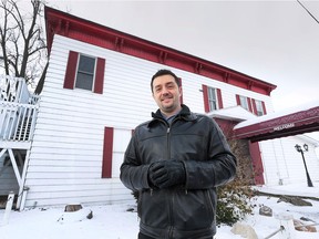 Kingsville Mayor Nelson Santos is shown in front of the former Kings Landing Restaurant and Tavern in Kingsville, Ont., on Feb. 11, 2016.