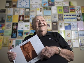 Ivan Jones, 96, is pictured in his room at Seasons Royal Oak Village, in front of dozens of birthday cards he received on his leap year birthday, Monday, Feb. 29, 2016.