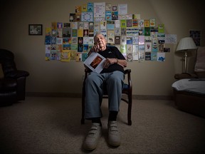 Ivan Jones, 96, is pictured in his room at Seasons Royal Oak Village, in front of dozens of birthday cards he received on his leap year birthday, Monday, Feb. 29, 2016.