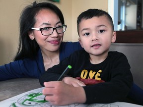 Tina Kennedy and her son Liam are shown at their Tecumseh, Ont. home on Friday, Feb. 12, 2016. Tina and her husband Richard noticed remarkable effects on the five-year-old's autism after he was prescribed an antibiotic for strep throat.