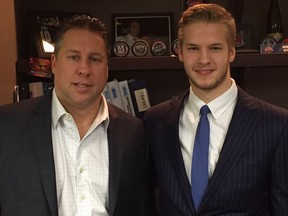 Windsor Spitfires VP and General Manager Warren Rychel and forward Mads Eller are pictured in this handout photo.