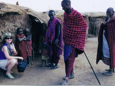 Theresa Dugal visited a Maasai tribe during her first trip to Africa about 15 years ago. Traveling with her husband Randy and a small group, they brought some basic needed supplies like calculators, pencils, pens, paper, candy – even balloons from her office. “[It] touched all our hearts, the joy they had with the smallest items they treasured,” she says. - Courtesy Theresa Dugal