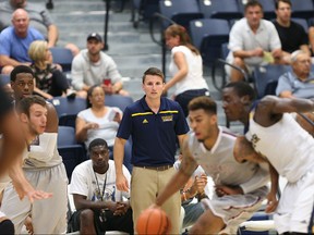 University of Windsor interim men's head basketball coach Ryan Steer is pictured during action vs University of Indianapolis at the St. Denis Centre on Aug. 18, 2015 in Windsor, Ont.