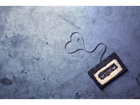 Vintage audio cassette with magnetic tape. Photo by fotolia.com.