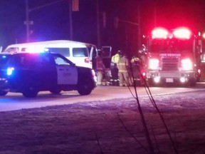 Emergency crews work on the scene of a crash on Walker Road Tuesday, Feb. 9, 2016