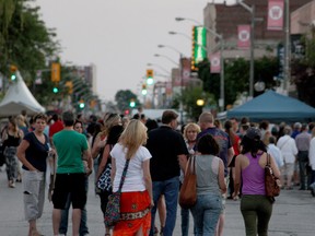 Patrons stroll along Wyandotte Street East for a street festival in this July 2014 file photo.