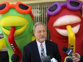 WINDSOR, ON.: JUNE 5, 2014 -- Larry Horwitz, chairman of the DWBIA, pleads for sponsors for the upcoming Balloonapalooza in front of the DWBIA offices in Windsor on Thursday, June 5, 2014. According to Horwitz the festival will be cancelled unless they are able to generate another $30,000 in sponsorship.              (Tyler Brownbridge/The Windsor Star)