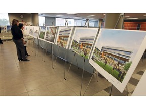 In this file photo, Windsor residents get a chance to look over proposals for the new city hall and vote on their favourite during an open house at city hall in Windsor on Tuesday, Sept. 16, 2014.                    (TYLER BROWNBRIDGE/The Windsor Star)