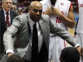 Windsor Express head coach Bill Jones gets his message to the team during a second quarter time out against The Island Storm at WFCU Centre Thursday November 21, 2013.