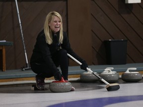 Star fitness reporter Kelly Steele lines up to release a rock during a game of sturling — another form of curling — at the Roseland Golf and Curling Club on Feb. 1, 2016.