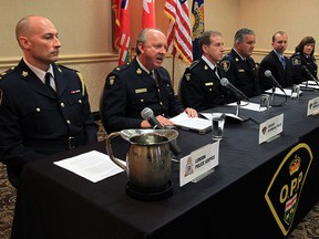 London deputy police Chief Darryl Longworth, left, OPP Commander Glenn Miller, OPP Det. Insp. James Smyth, Windsor police Supt. Edward Hickey, U.S. Immigration special agent Matthew Stentz and CBSA director Tamara Allard during OPP Organized Crime Enforcement Bureau announcement March 10, 2016.